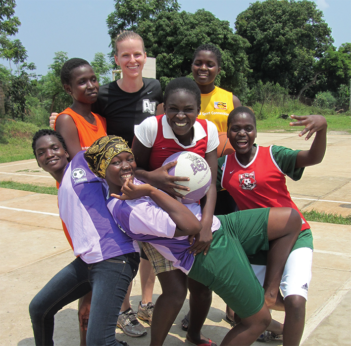 Meredith Whitley, Ph.D., (center) collaborated with Alisha Johnson, M.S., at the University of Tennessee, Knoxville, (not pictured) and community leaders in Uganda to evaluate and expand sports opportunities for girls.
