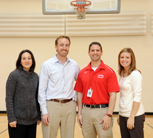 Joining forces to improve the health and fitness of public school students in Freeport are (from left to right) Anne Gibbone, Ed.D., Kevin Mercier, Ed.D., Freeport High School athletics director Jonathan Bloom, M.A. '00, and Kadi Bliss, Ph.D.