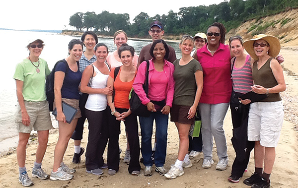 As part of a Race to the Top grant-funded program, Emily Kang, Ph.D., (third from left) and Mary Jean McCarthy (left) led second-grade teachers from Freeport, New York, on an immersive science field trip to Long Island’s Caumsett State Historic Park Preserve.