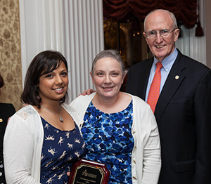 Krystle and Maria S Narine with President Dr. Robert A. Scott