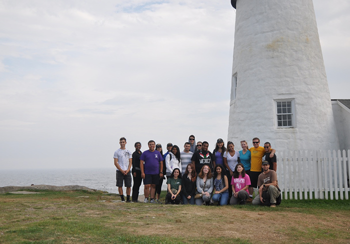 whole class in front of the light house at Pemaquid Point lighthouse, Maine.